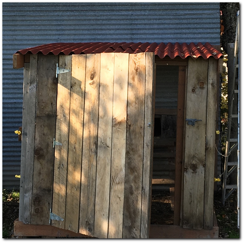 Finished chicken run with old barn wood
