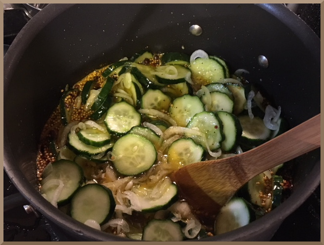 Add cucumbers and onions to brine